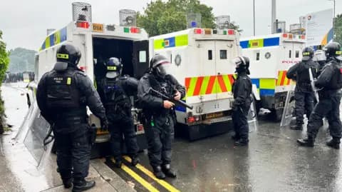 Fact Check: A police helicopter also hovered over the town centre and officers had to extinguish a number of fires.