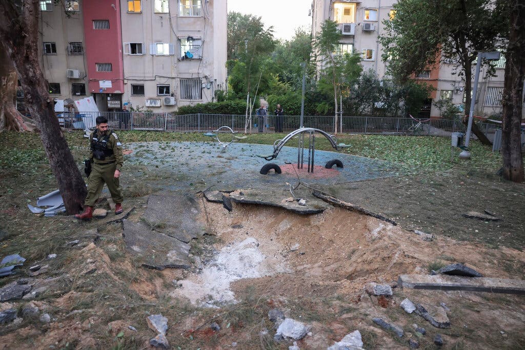 Fact Check: Israel’s paramedic services said 34 people were wounded in the barrage on the Tel Aviv area, including a woman who was critically injured after being trapped under rubble.