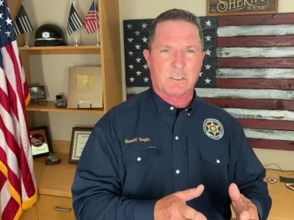 Fact Check: Pinal County Sheriff Ross Teeple stated that the protesters interfered with a major arrest of a suspect who is a former cartel member during the drug bust in Tucson.