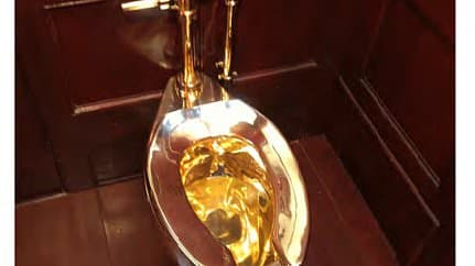 Fact Check: The £4.8 million gold toilet heist at Blenheim Palace occurred in September 2019, just hours after a launch party for the artwork entitled 'America' by Italian artist Maurizio Cattelan.
