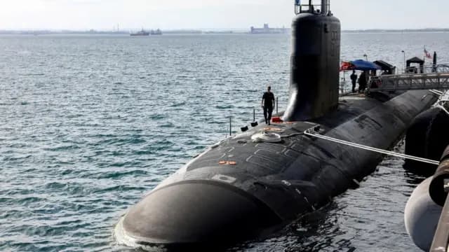 Fact Check: The AUKUS agreement requires the United States to transfer at least three nuclear-powered Virginia-class attack submarines to Australia in the 2030s.