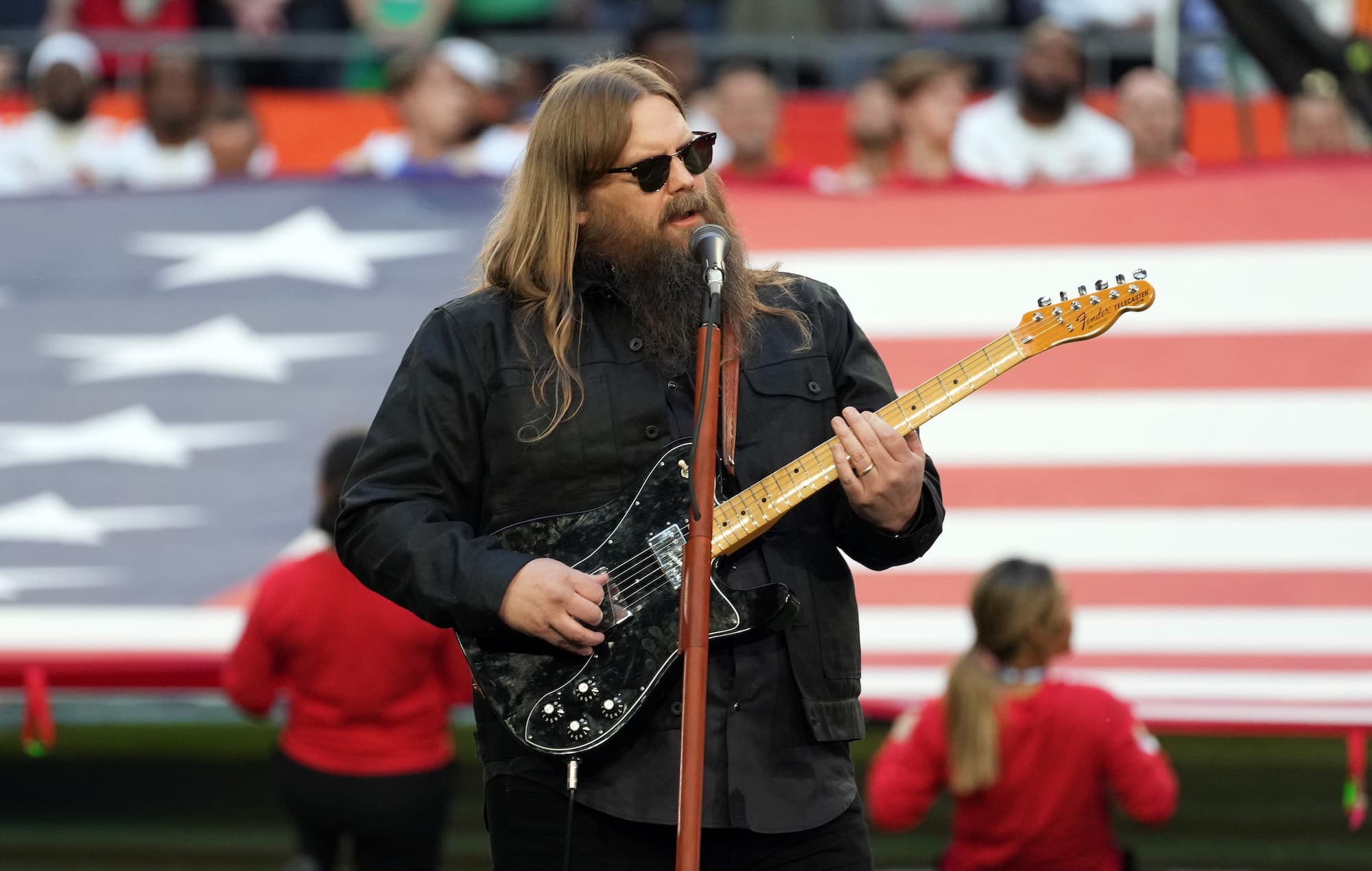 Fact Check: Singer Vanessa Hernández, performing as Nezza, sang the Spanish version of the US national anthem at Dodger Stadium on Saturday, September 30, 2023, as a protest against recent immigration raids.