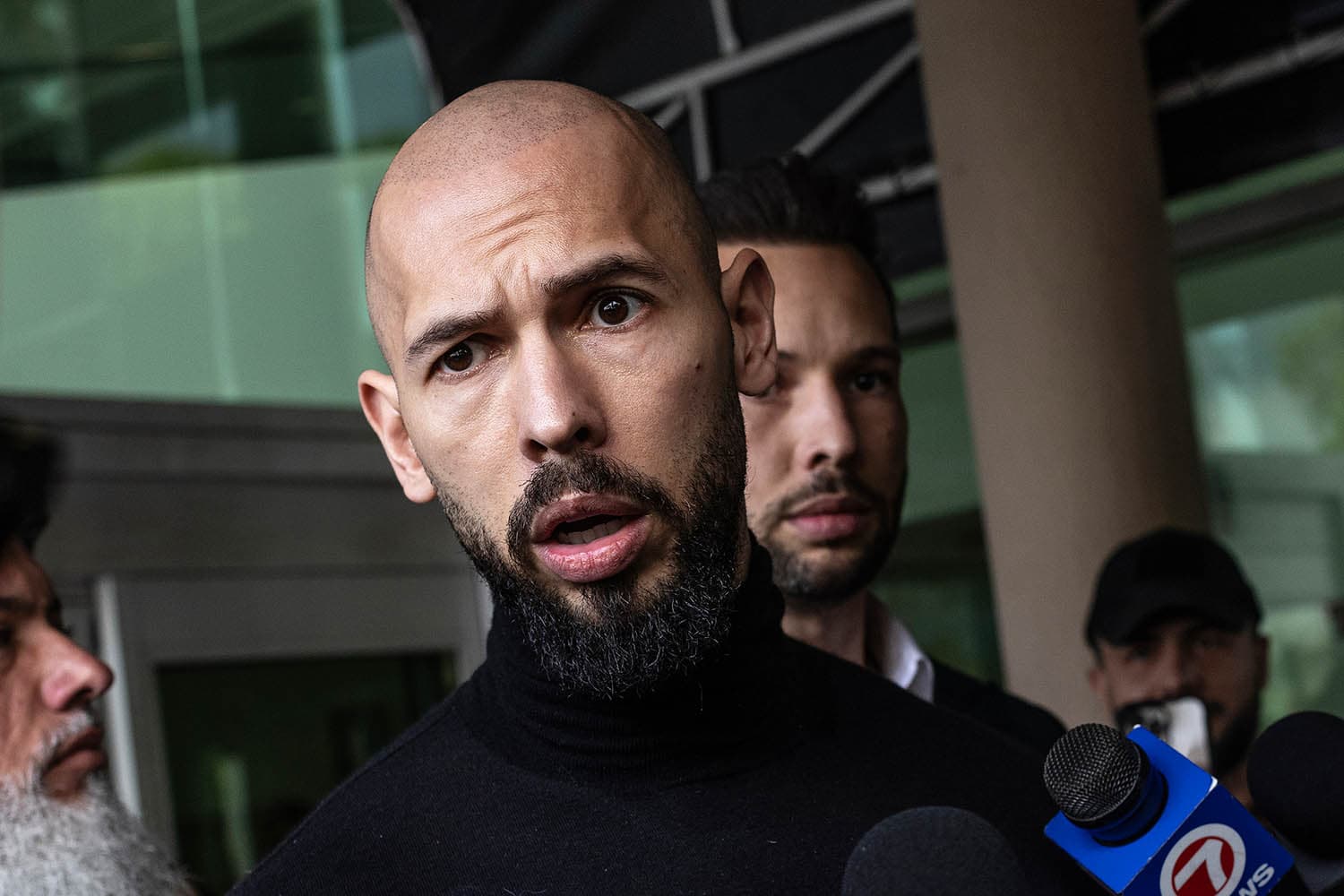 Fact Check: Prosecutors lifted a two-year travel ban on the Tate brothers.