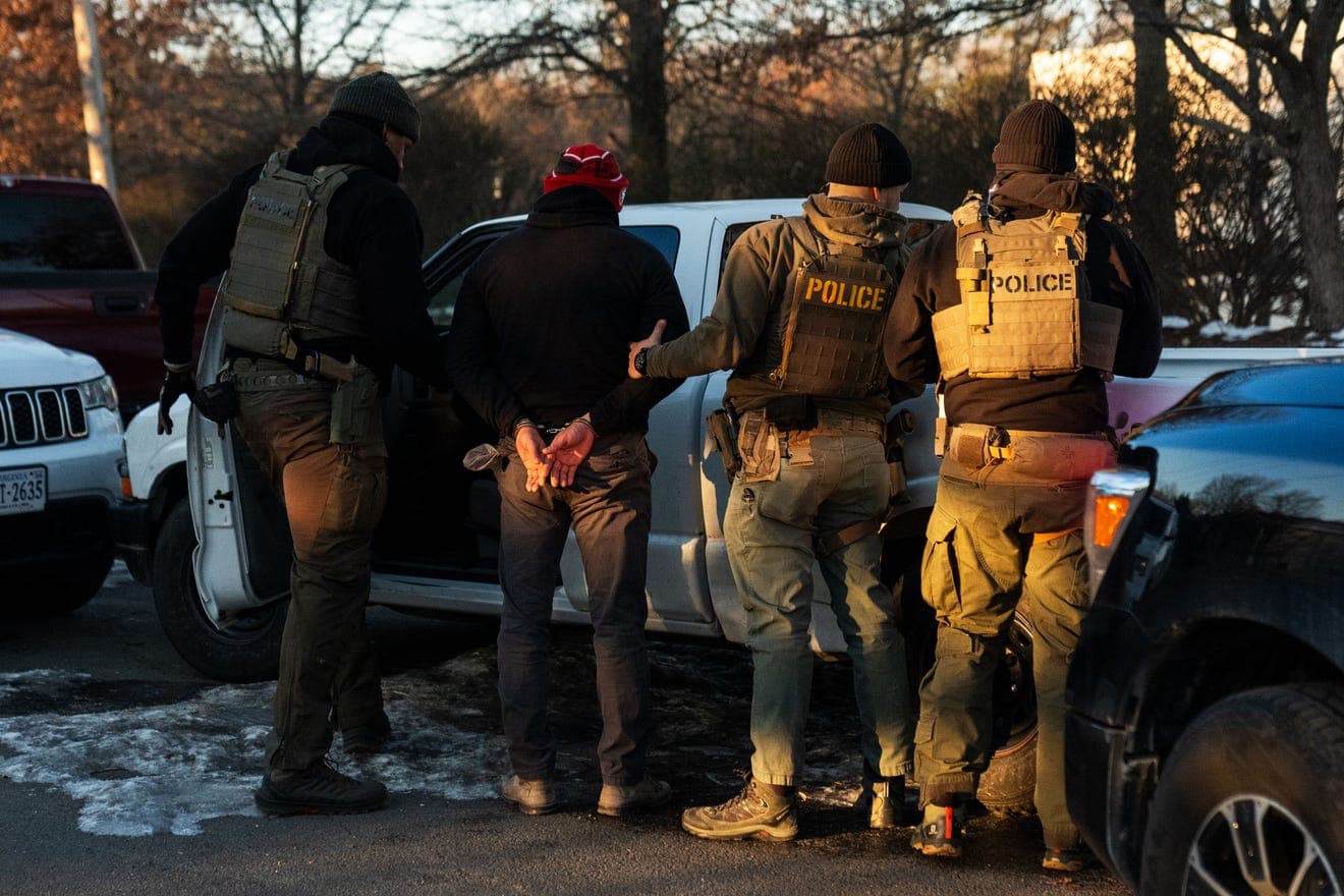 Fact Check: Federal agents high-fived after arresting 31 immigrants in a single day.