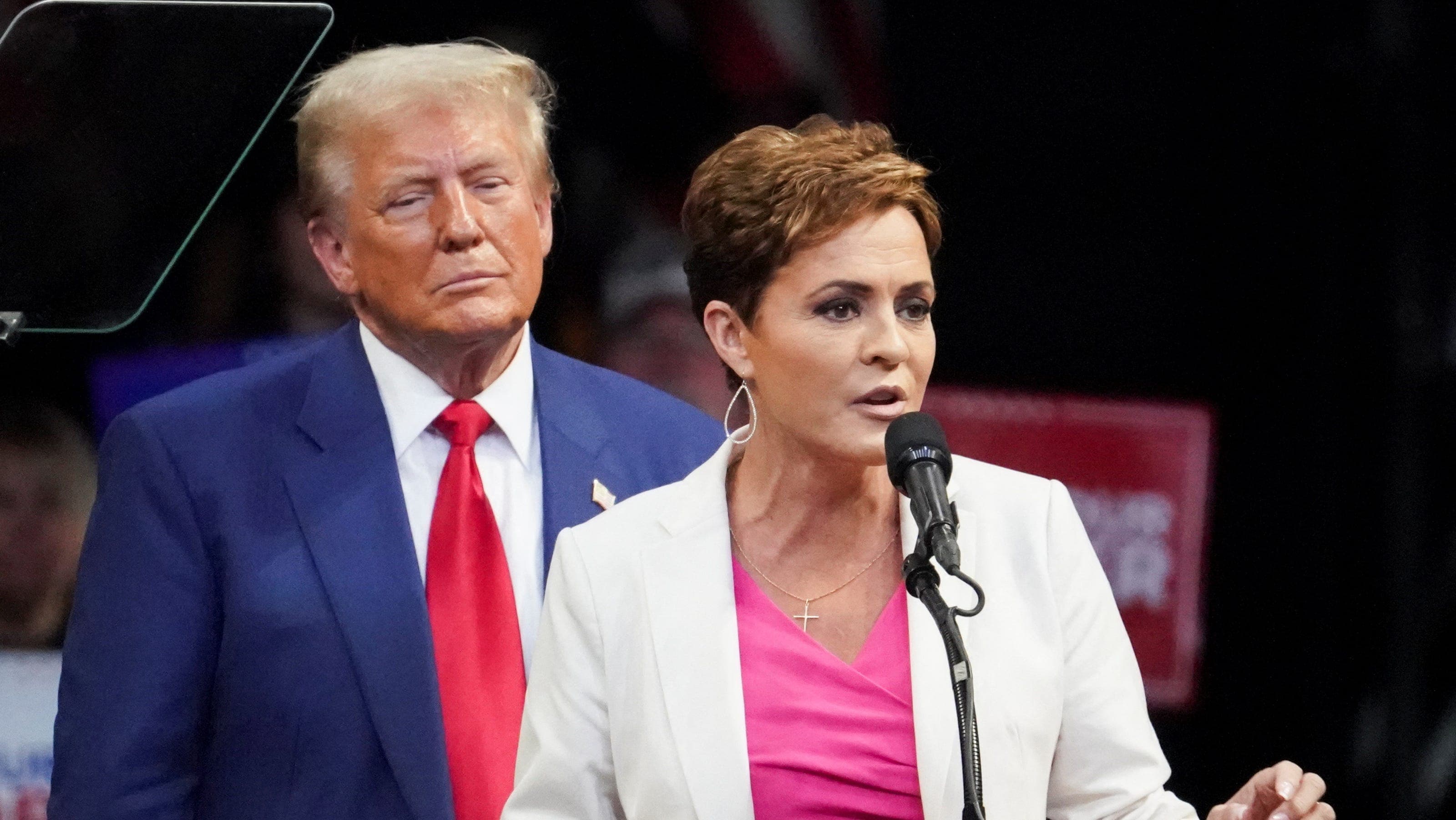 Fact Check: Kari Lake held up Trump's picture during job cuts questioning.