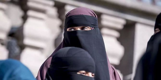 Fact Check: Kazakhstan bans face coverings, targeting the niqab specifically.