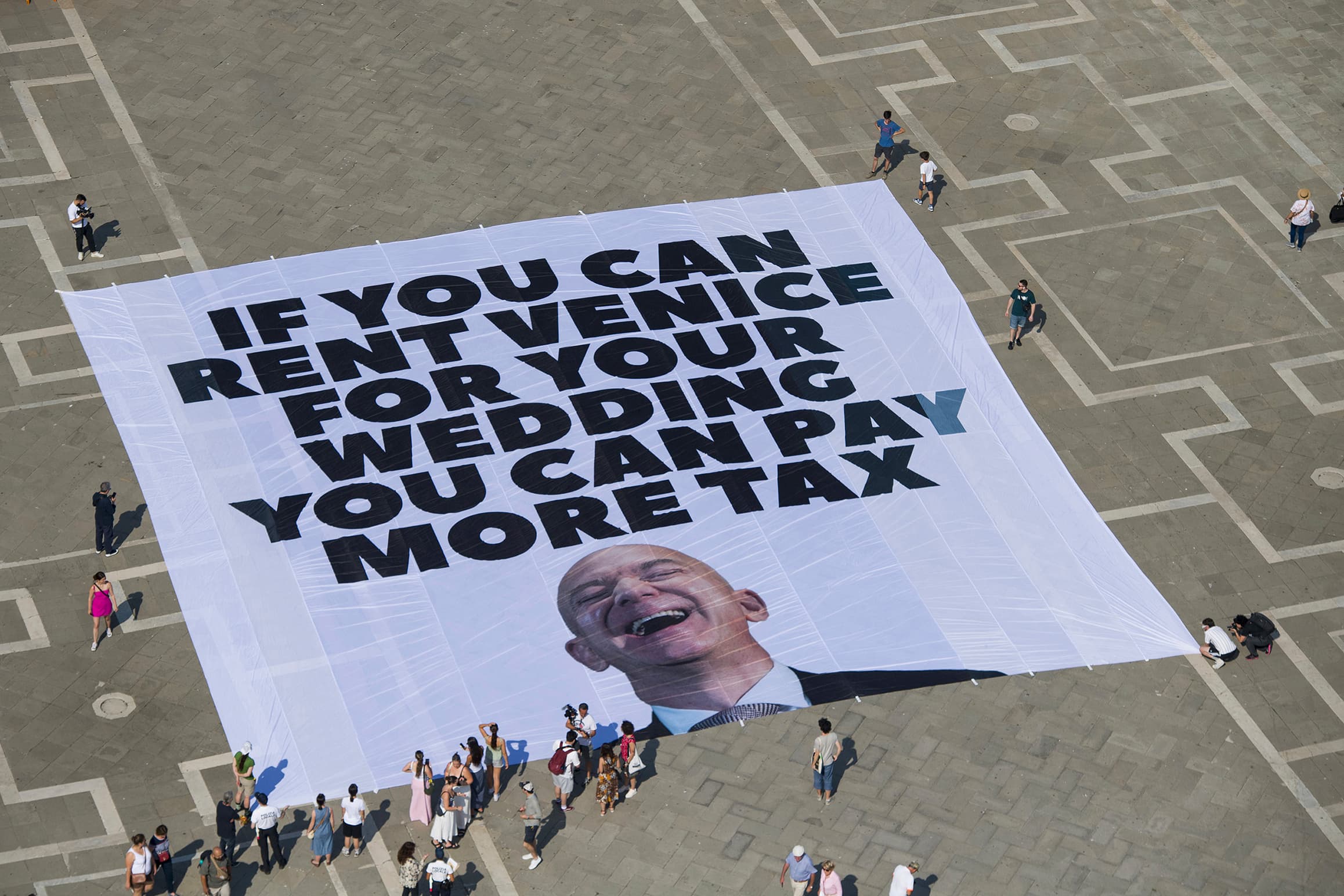 Fact Check: Greenpeace joins protests against Bezos' tax breaks in Venice.