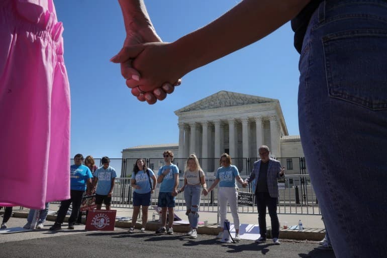 Fact Check: An armed man was arrested outside Kavanaugh's home amid abortion ruling tensions.