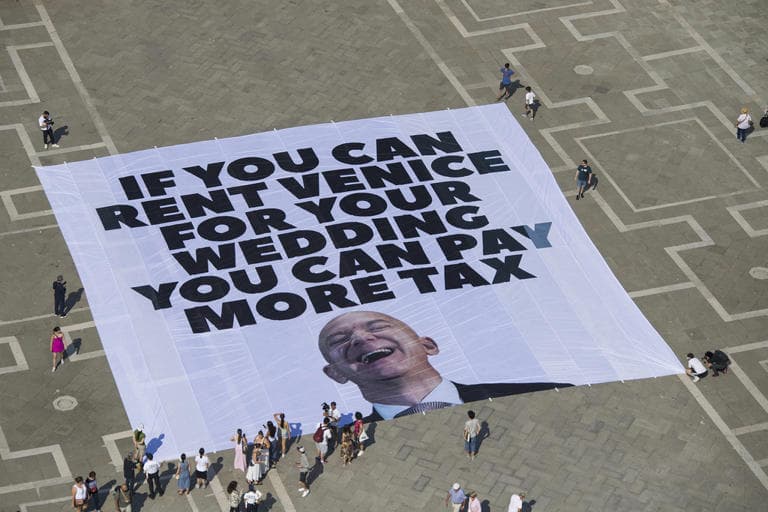 Fact Check: Greenpeace joins protests against billionaire tax breaks at Bezos wedding.