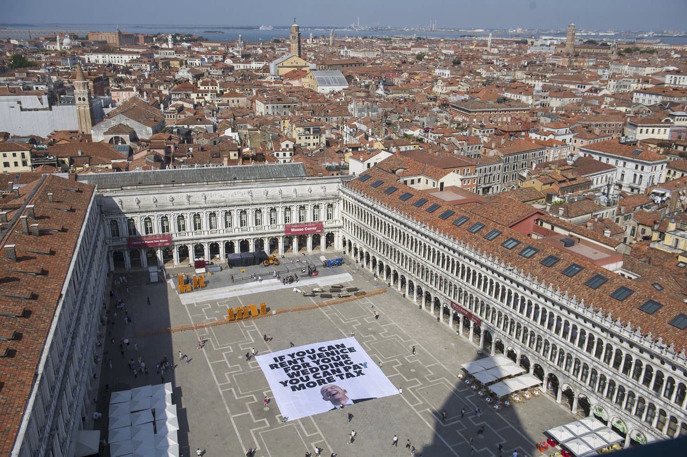 Fact Check: Greenpeace joins anti-Bezos protest with banner against billionaire tax breaks.