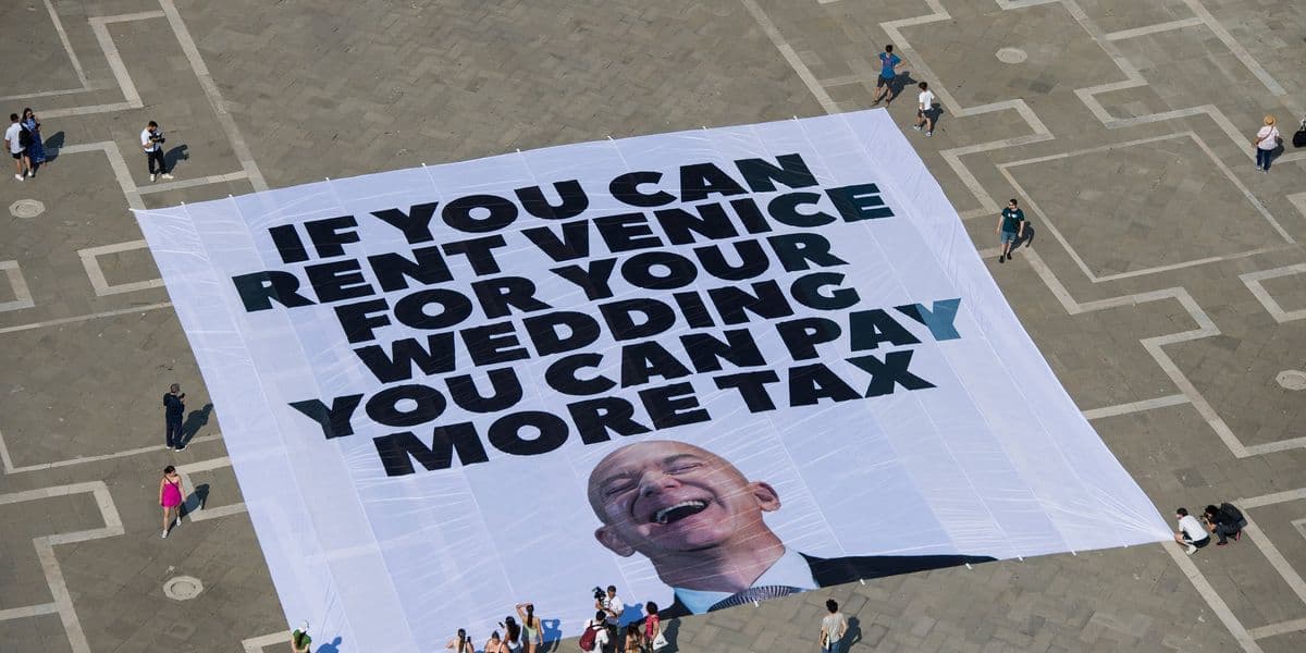 Fact Check: Greenpeace protests Bezos' wedding, demanding an end to billionaire tax breaks.