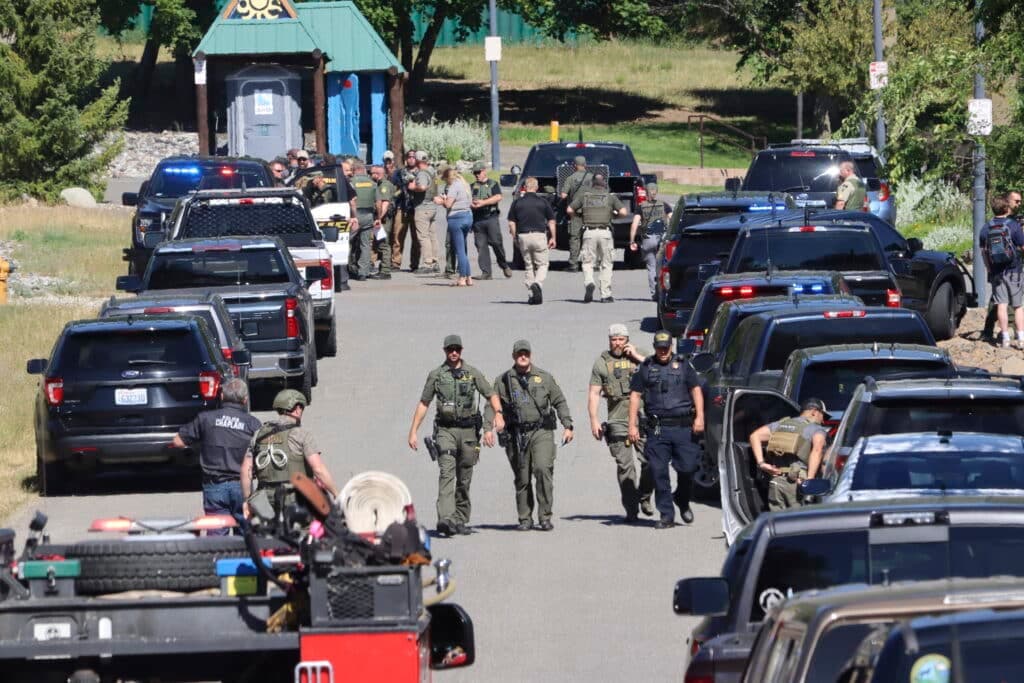 Fact Check: Gunman believed to have started fire to target firefighters.
