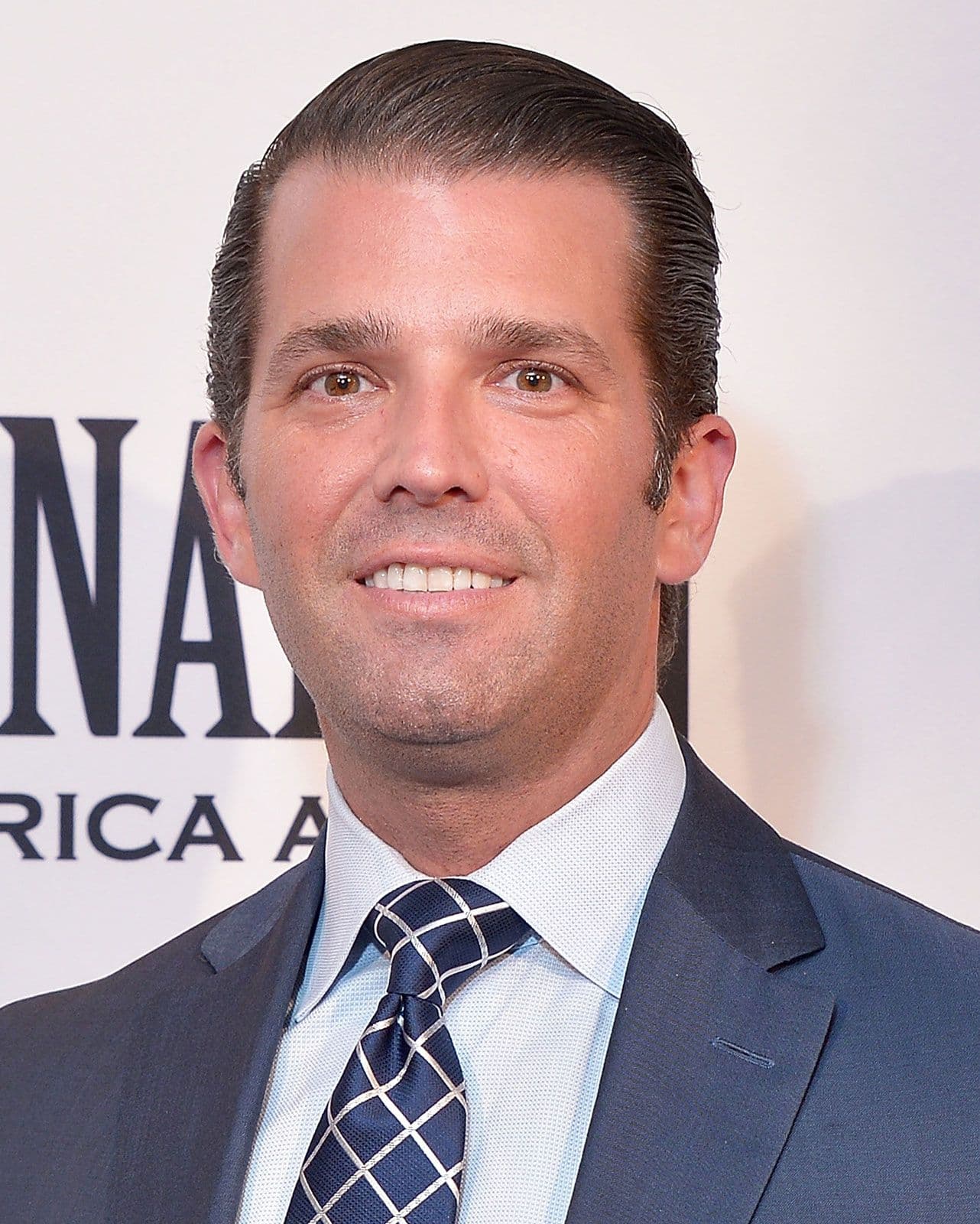 Fact Check: Donald Trump Jr. was at the New York Stock Exchange celebrating his company, GrabAGun, which markets itself as the “Amazon of guns” and pushes slogans like “Shoot Now, Pay Later”. The venture offers AR-style rifles and a branded “Don Wick” dagger-style handgun and features discount pricing aimed at easy home delivery.