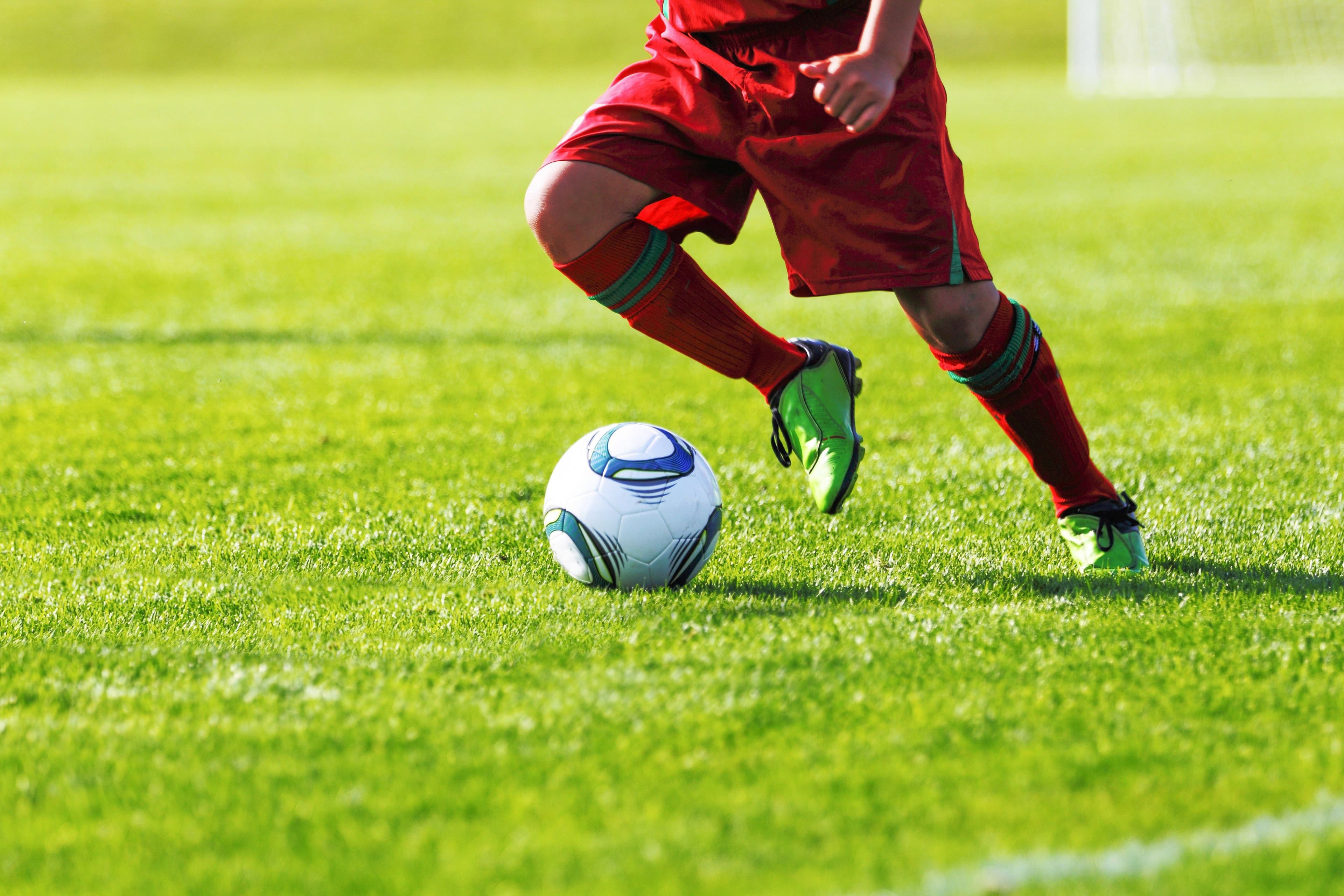 Fact Check: In European football,If the player didn't intentionally play the ball (even if it touched their boots slightly) and didn't interfere with an opponent, then they would not be penalized for offside. The goal should still count as long as the player did not actively participate in the play.
